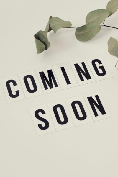 Eucalyptus branch with 'Coming Soon' message on white background for announcements.